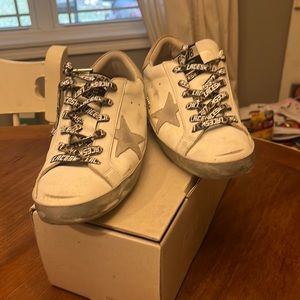 NIB. Size 40/10 Woman’s Golden Goose Deluxe Brand Sneakers.
